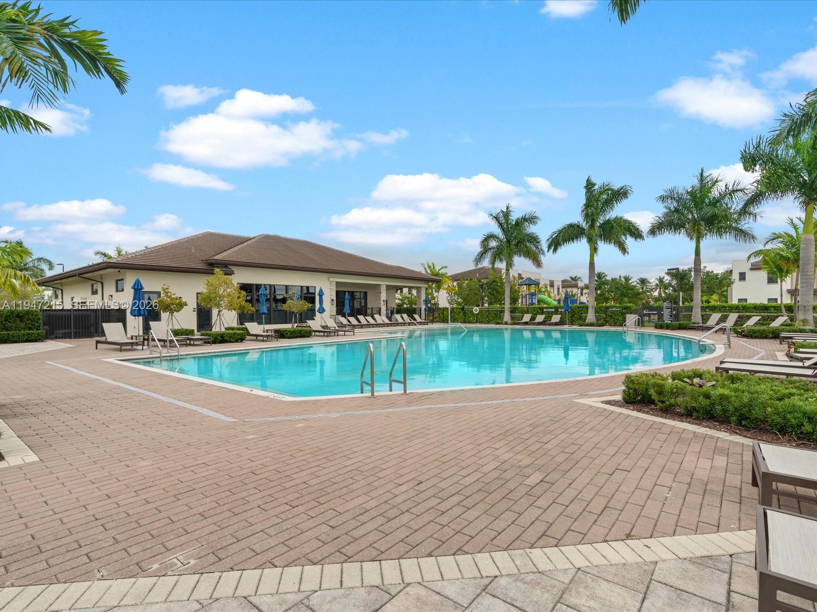 544 Northeast 206th Lane Miami, FL 33179 - Photo 39 of 48 a view of swimming pool with a yard