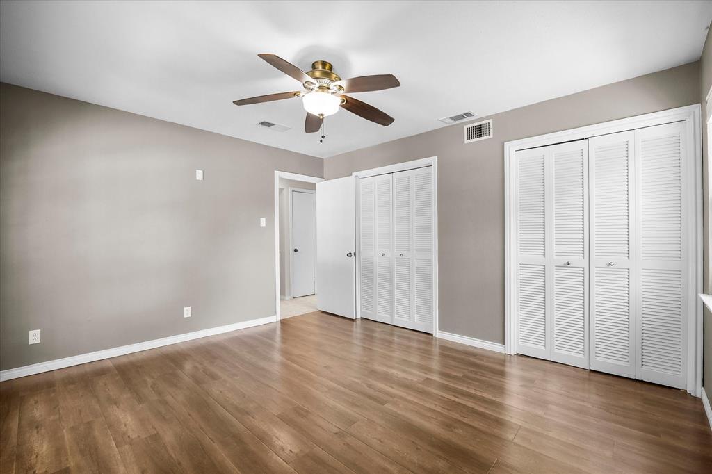 501 Ridgeview Drive Rockwall, TX 75087 - Photo 23 of 28 Spacious guest bedroom includes his and her closets