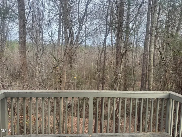 a view of a wooden fence