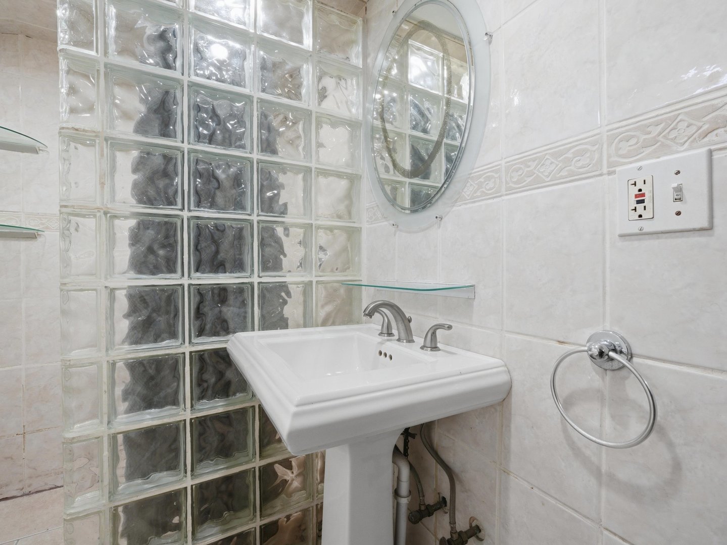 2352 2nd Avenue North Riverside, IL 60546 - Photo 22 of 37 a bathroom with a sink and a mirror