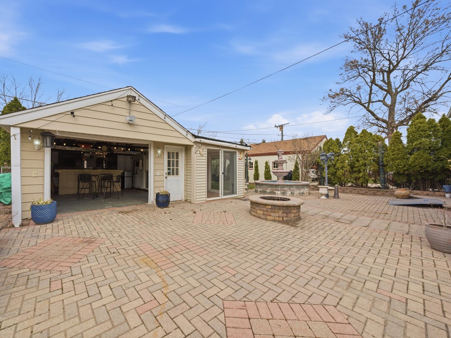2352 2nd Avenue North Riverside, IL 60546 - Photo 28 of 37 a view of a patio with table and chairs with wooden floor and fence