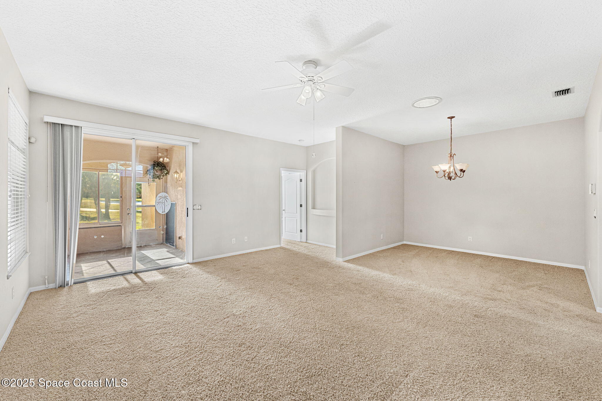 4221 Aberdeen Circle Rockledge, FL 32955 - Photo 17 of 45 a view of an empty room with a window