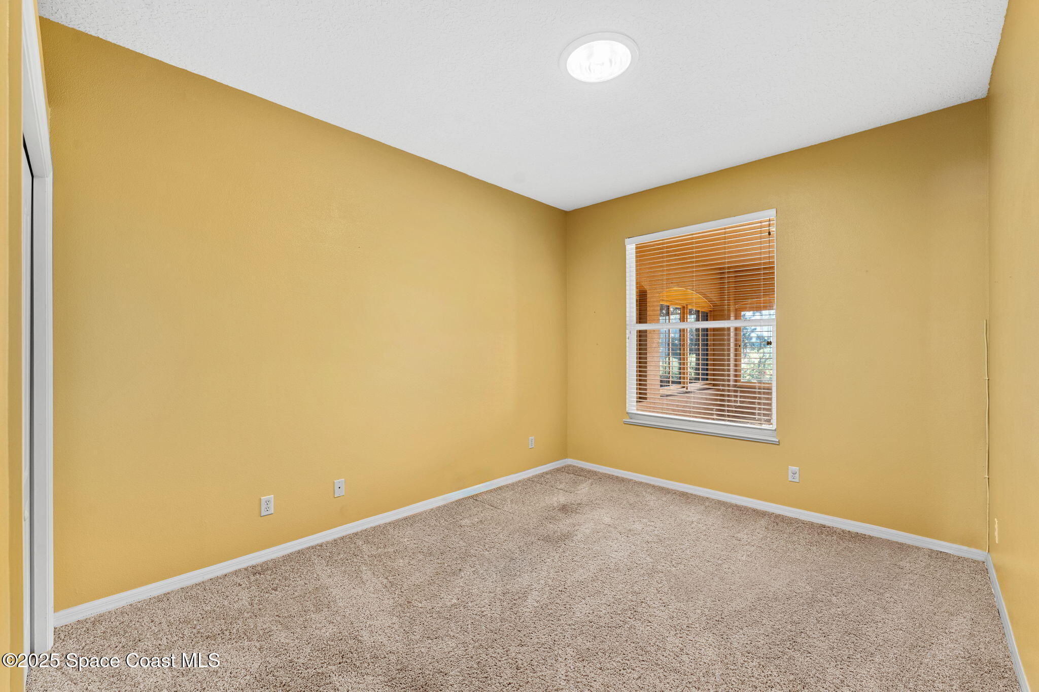 4221 Aberdeen Circle Rockledge, FL 32955 - Photo 22 of 45 a view of a big room with windows