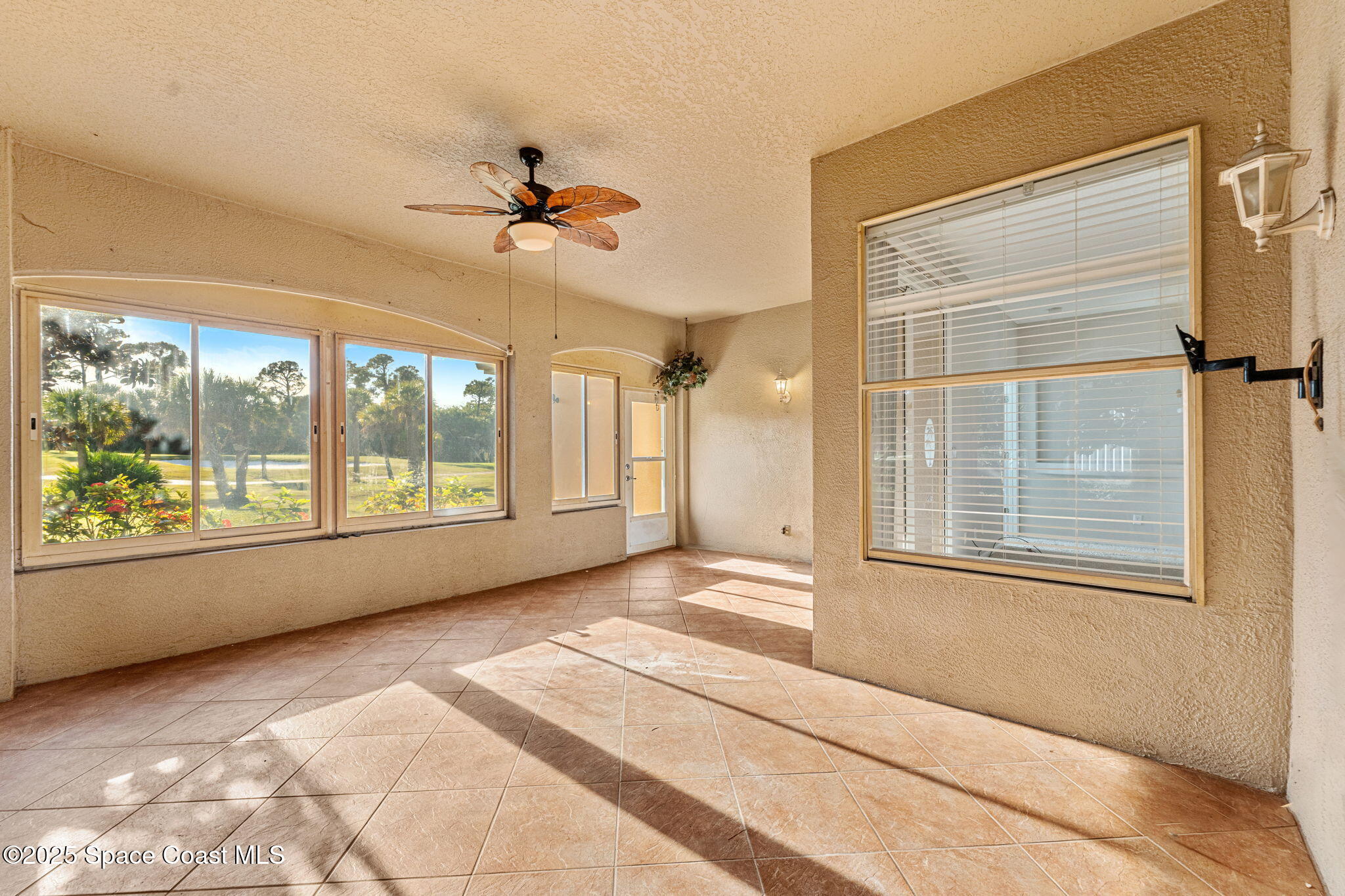 4221 Aberdeen Circle Rockledge, FL 32955 - Photo 26 of 45 a view of an empty room with a window