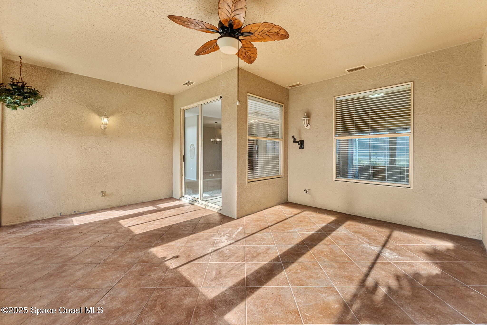 4221 Aberdeen Circle Rockledge, FL 32955 - Photo 27 of 45 a view of an empty room with a window