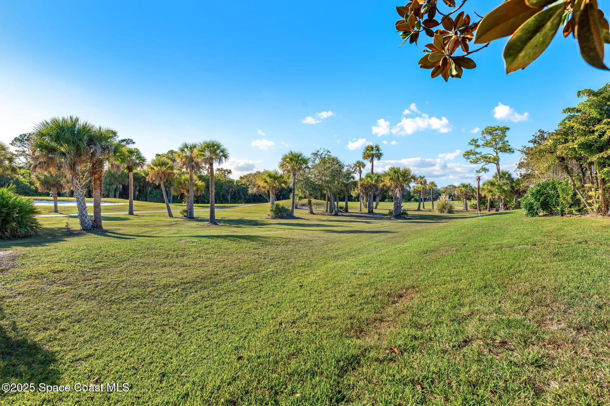 4221 Aberdeen Circle Rockledge, FL 32955 - Photo 29 of 45 a front view of a house with a big yard