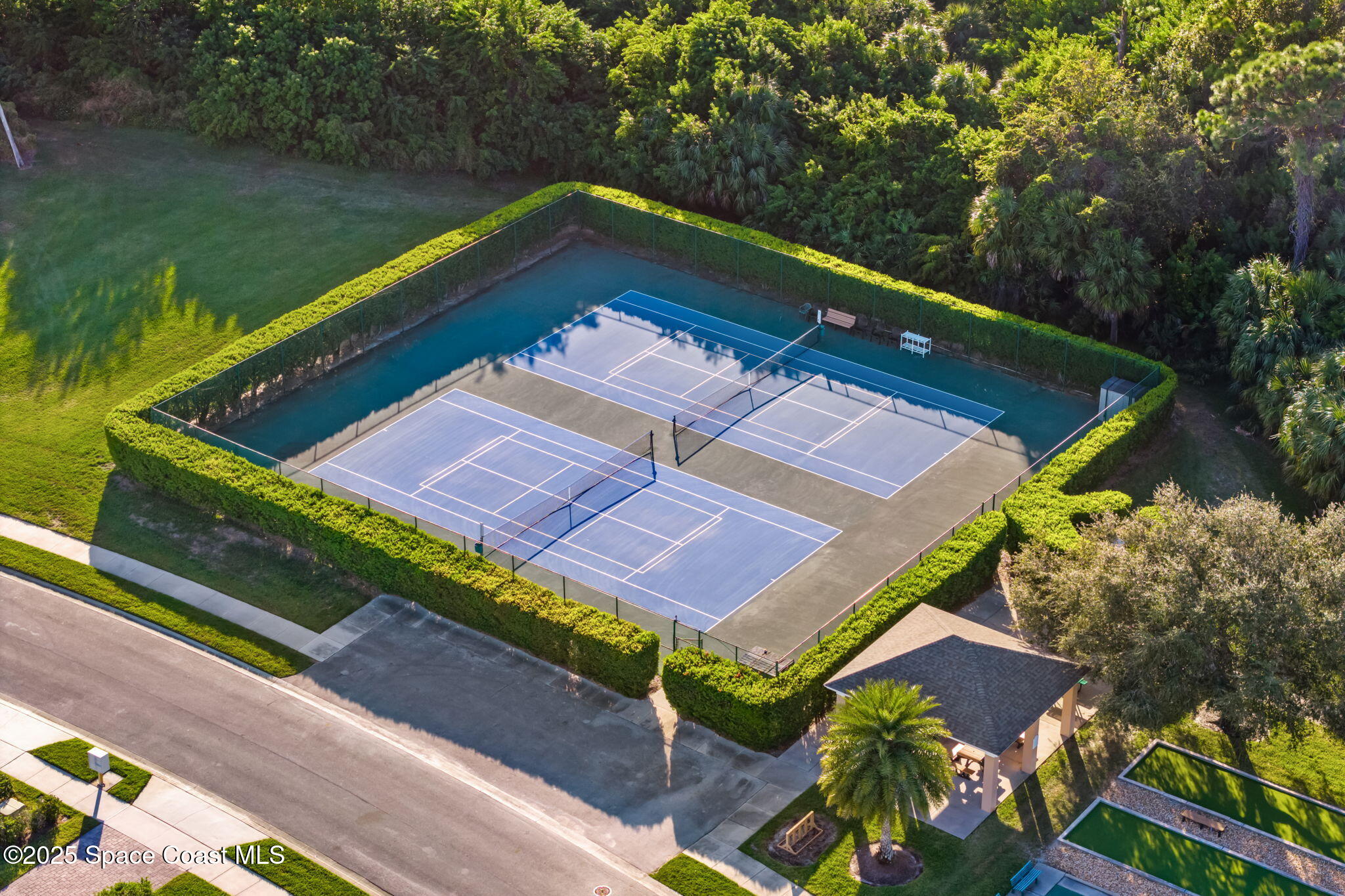 4221 Aberdeen Circle Rockledge, FL 32955 - Photo 32 of 45 an aerial view of a backyard