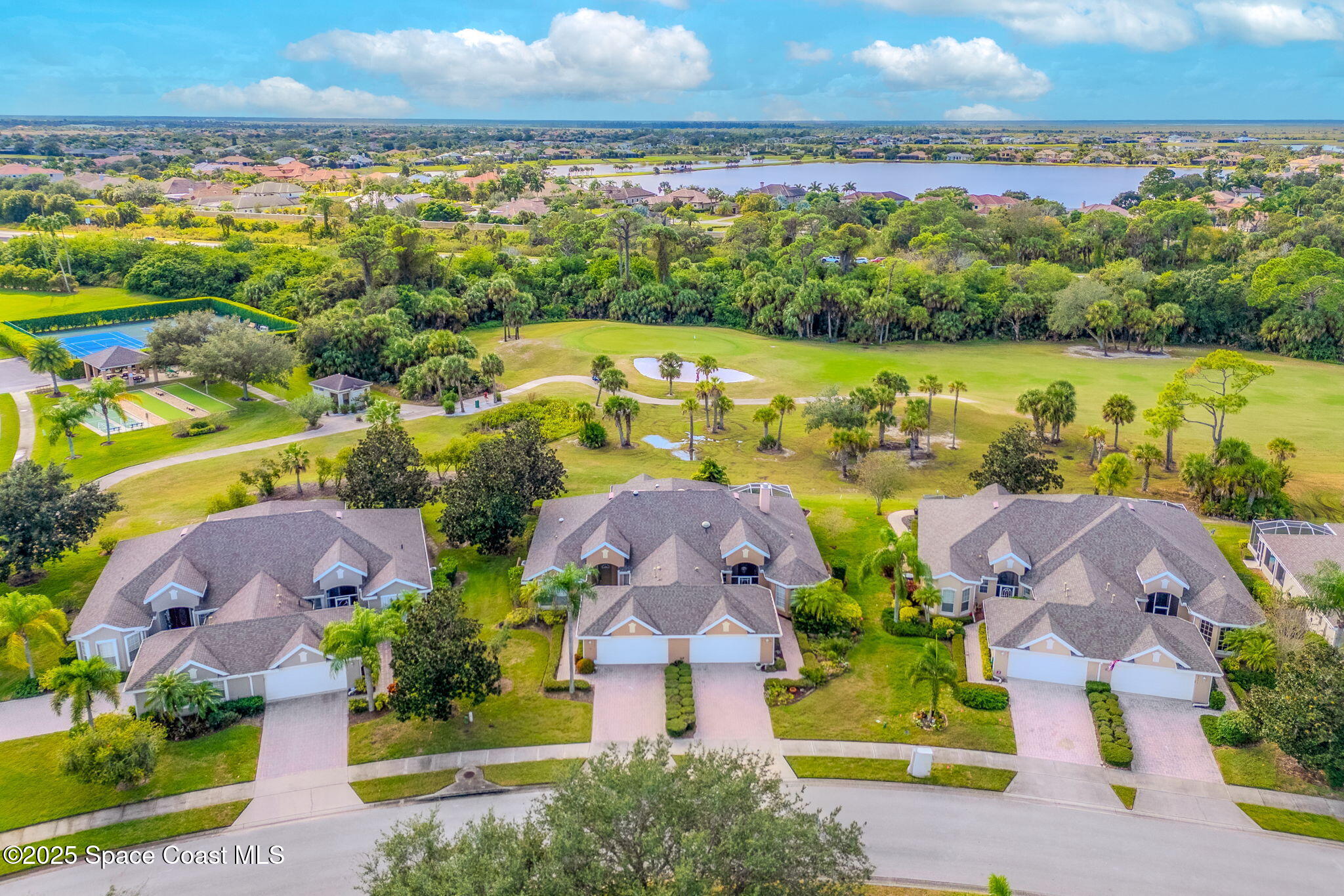 4221 Aberdeen Circle Rockledge, FL 32955 - Photo 38 of 45 an aerial view of residential houses with outdoor space and swimming pool