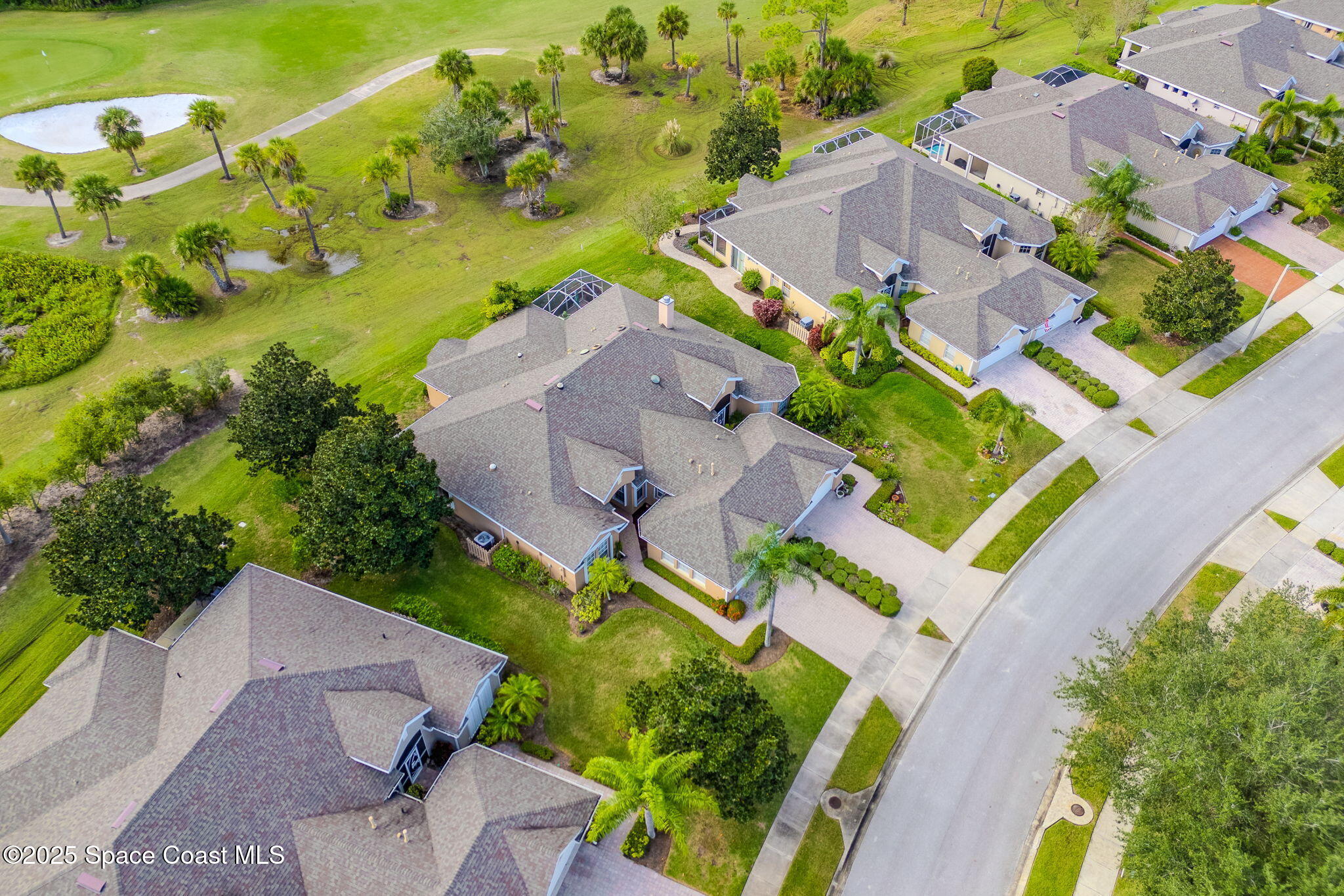 4221 Aberdeen Circle Rockledge, FL 32955 - Photo 39 of 45 an aerial view of a house with a swimming pool