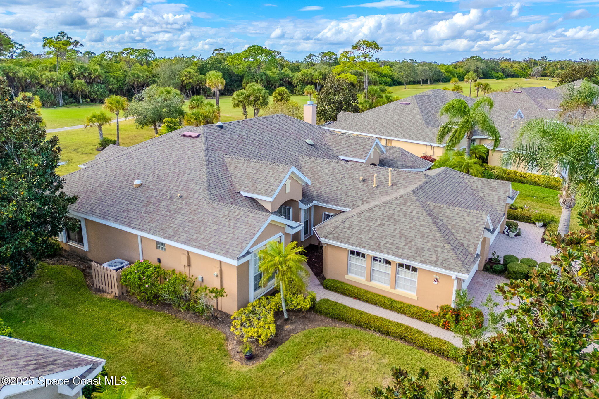 4221 Aberdeen Circle Rockledge, FL 32955 - Photo 4 of 45 an aerial view of a house with a big yard