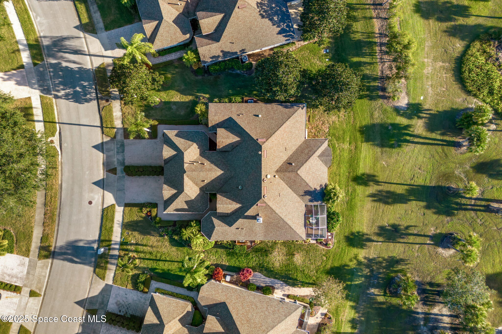 4221 Aberdeen Circle Rockledge, FL 32955 - Photo 42 of 45 an aerial view of multiple houses with yard