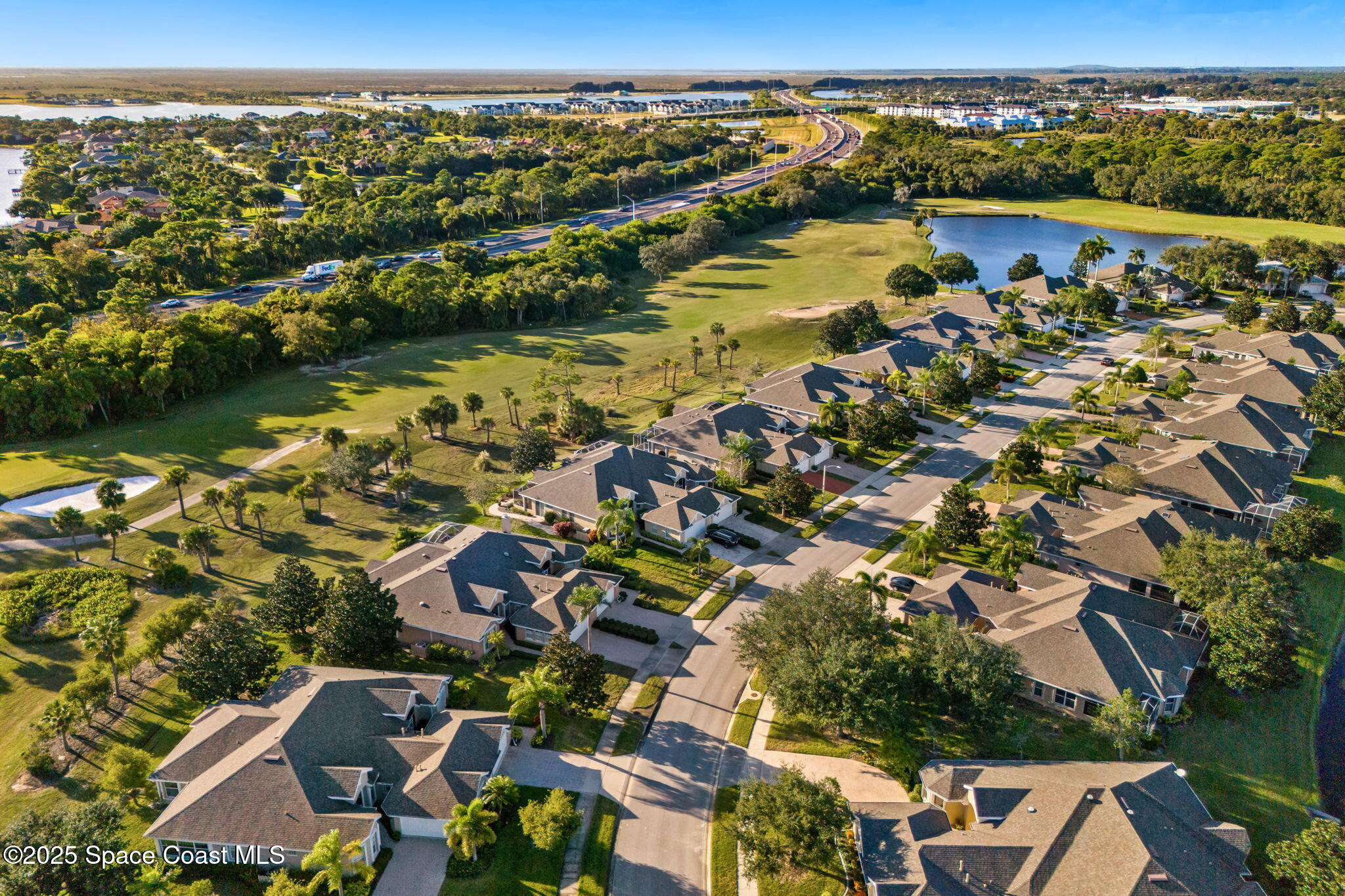4221 Aberdeen Circle Rockledge, FL 32955 - Photo 43 of 45 an aerial view of residential houses with outdoor space