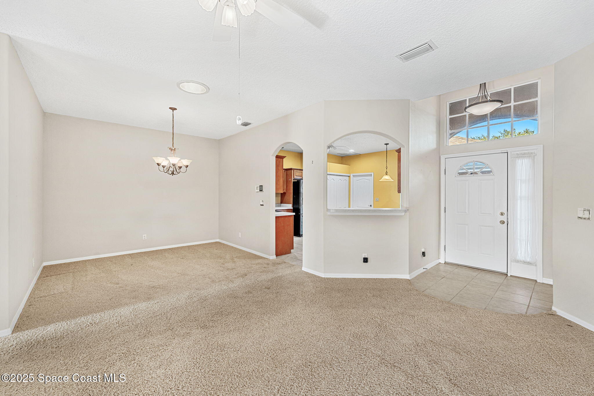 4221 Aberdeen Circle Rockledge, FL 32955 - Photo 6 of 45 a view of an empty room with a window