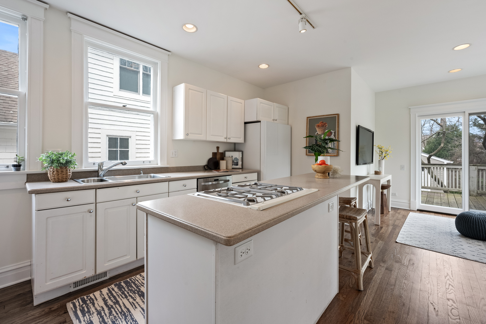 841 Prospect Avenue Winnetka, IL 60093 - Photo 11 of 35 a kitchen with a sink stove and wooden cabinets