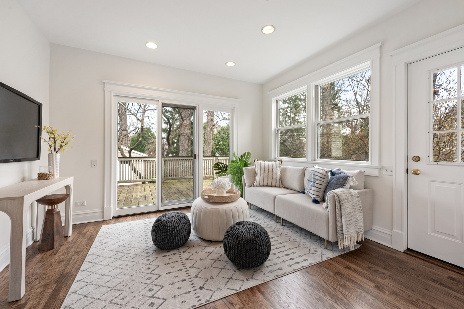 841 Prospect Avenue Winnetka, IL 60093 - Photo 13 of 35 a living room with furniture and a flat screen tv