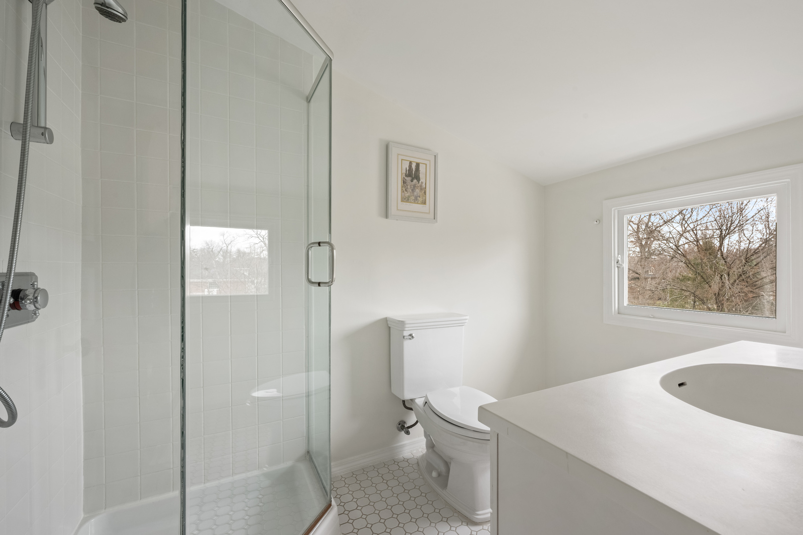 841 Prospect Avenue Winnetka, IL 60093 - Photo 25 of 35 a bathroom with a sink a toilet and shower