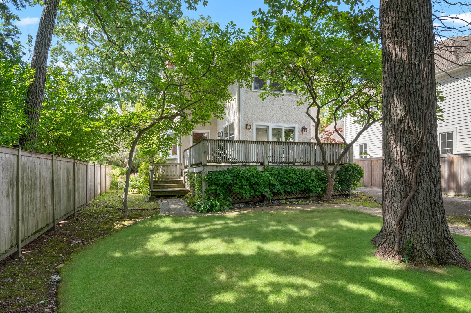 841 Prospect Avenue Winnetka, IL 60093 - Photo 30 of 35 a view of a backyard with a tree