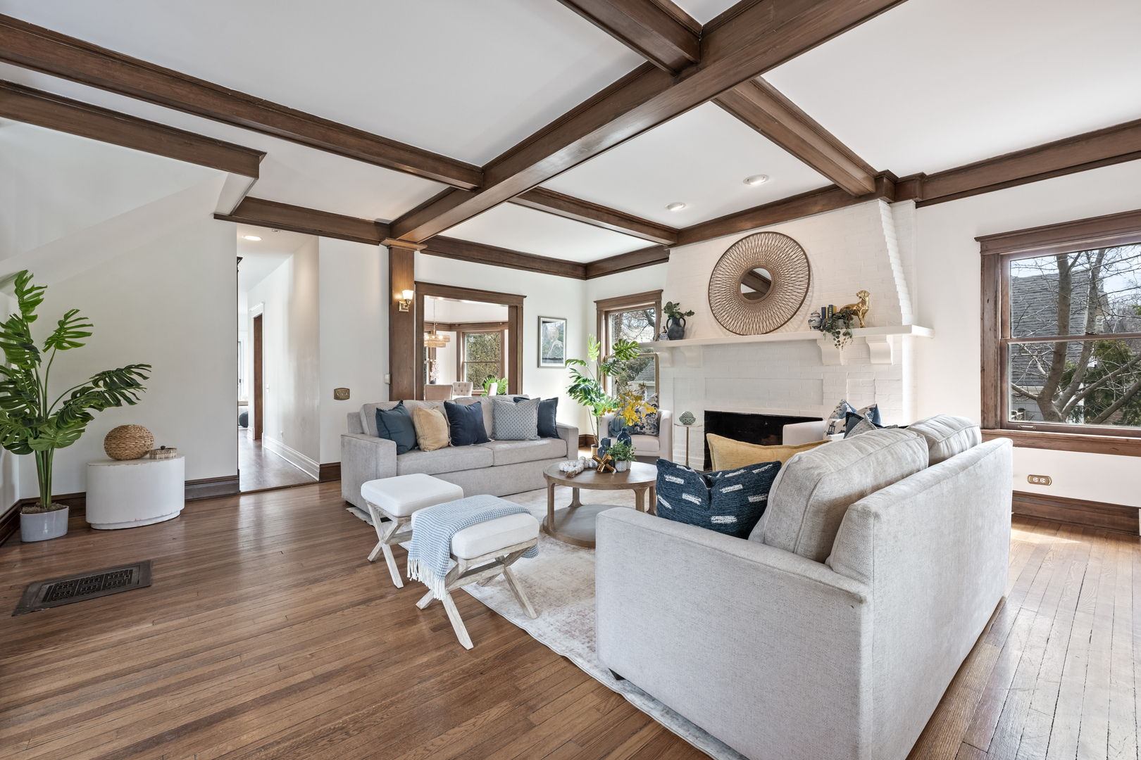 841 Prospect Avenue Winnetka, IL 60093 - Photo 3 of 35 a living room with furniture a fireplace and a large window