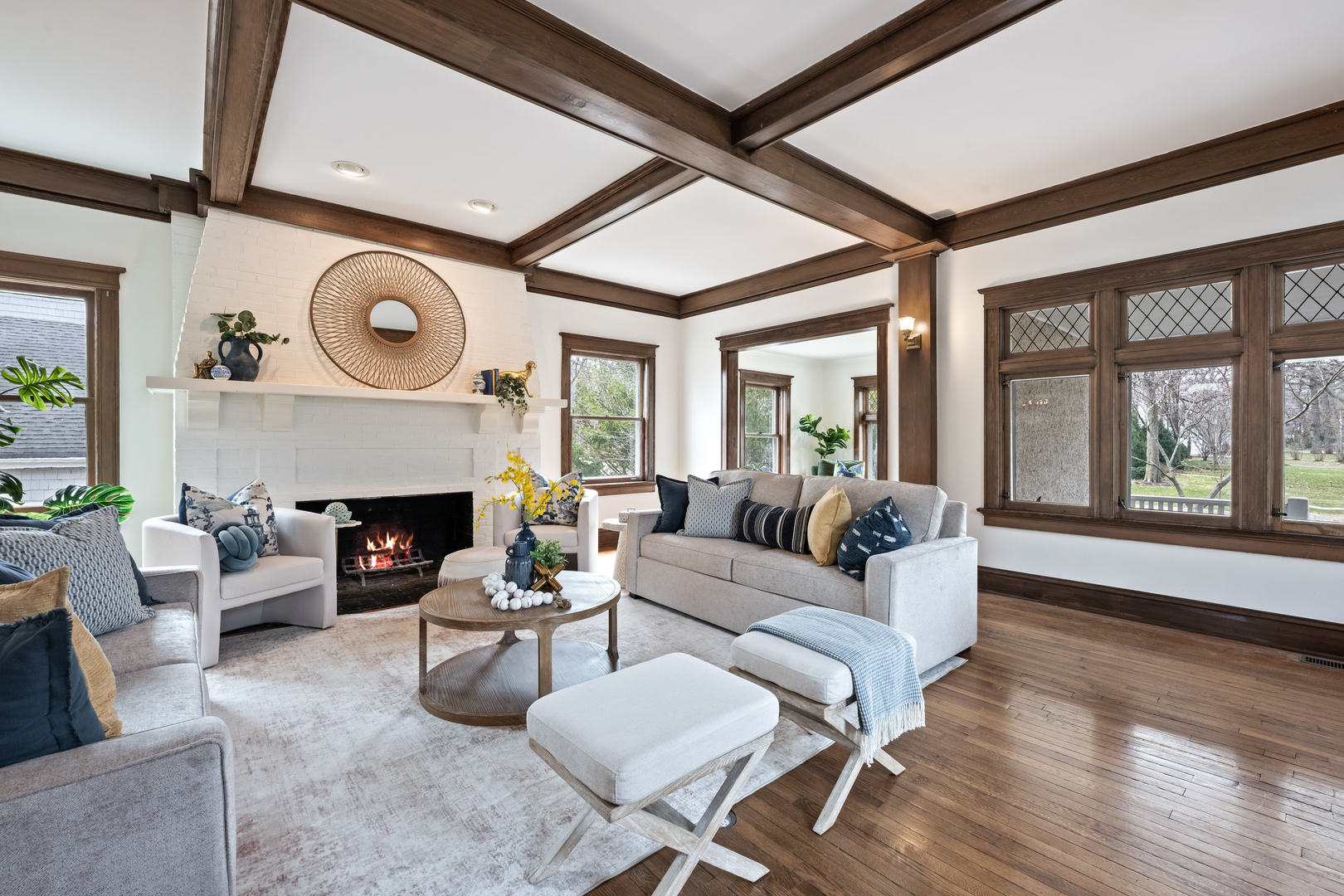 841 Prospect Avenue Winnetka, IL 60093 - Photo 5 of 35 a living room with furniture a fireplace and a large window