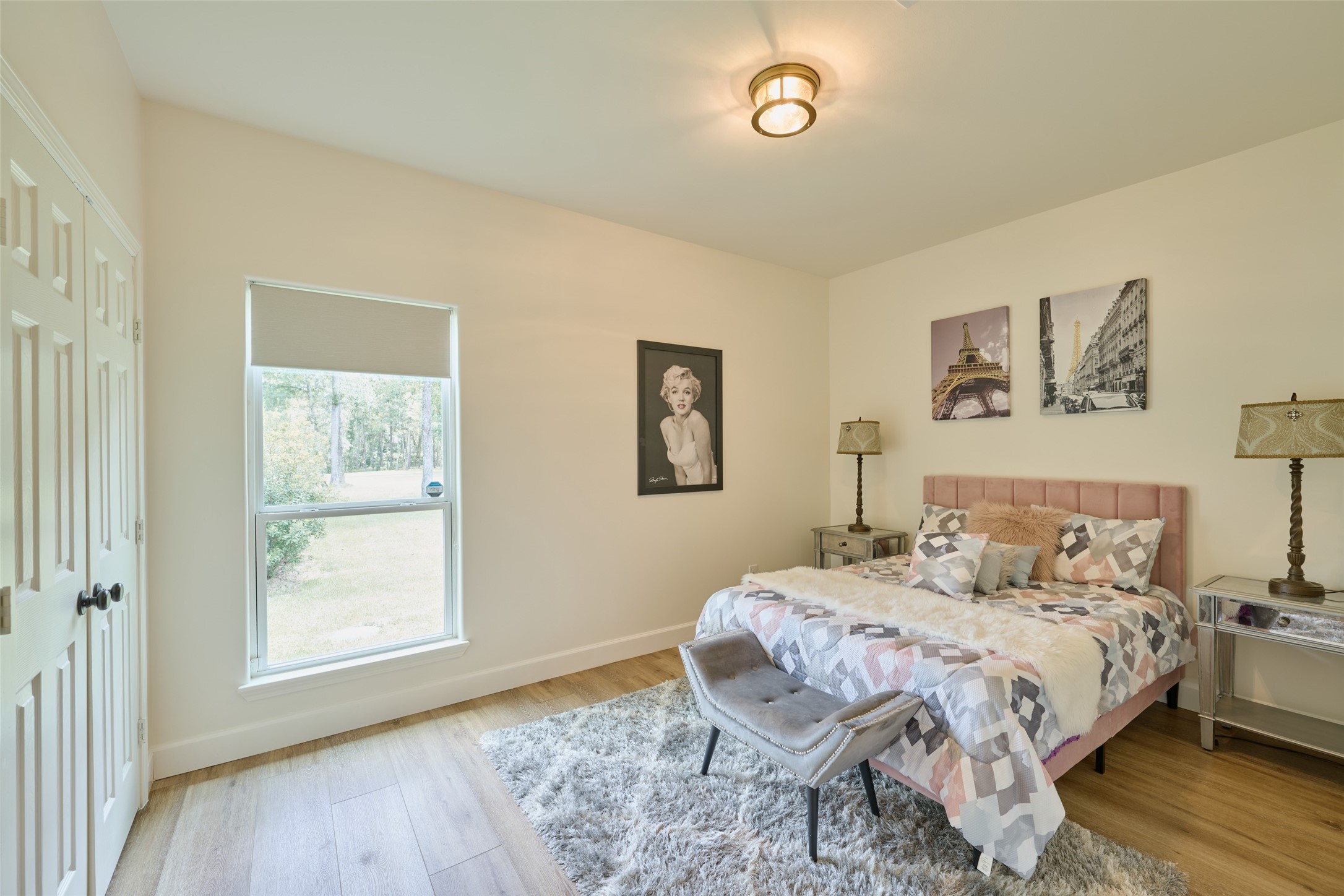 2218 Honea Egypt Road Magnolia, TX 77354 - Photo 39 of 50 Tranquil Third Bedroom: Bright and cozy with a plush carpet, serene views, and tasteful decor.