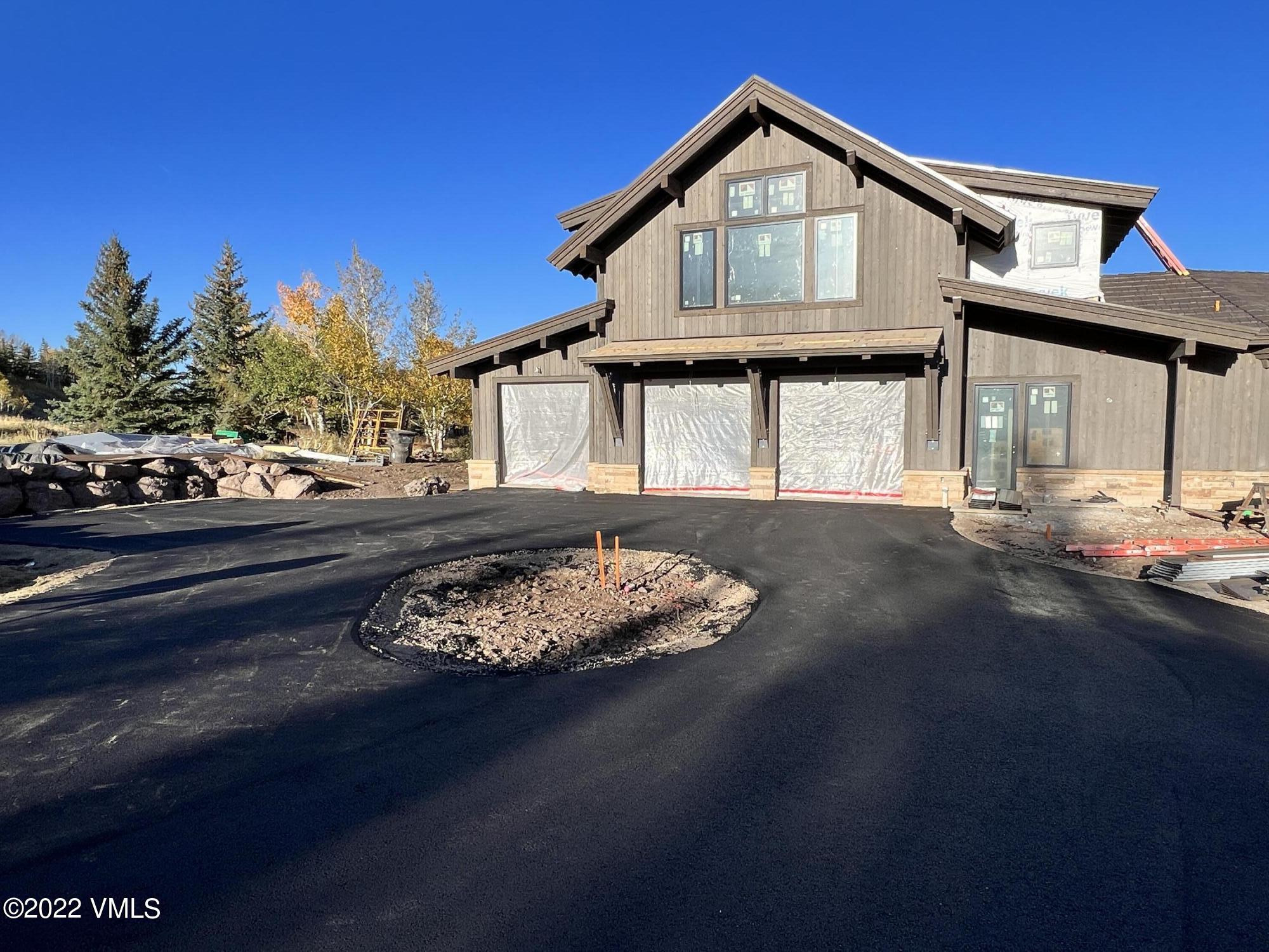 29 Kimberwick Way Edwards, CO 81632 - Photo 15 of 46 a front view of a house with a yard