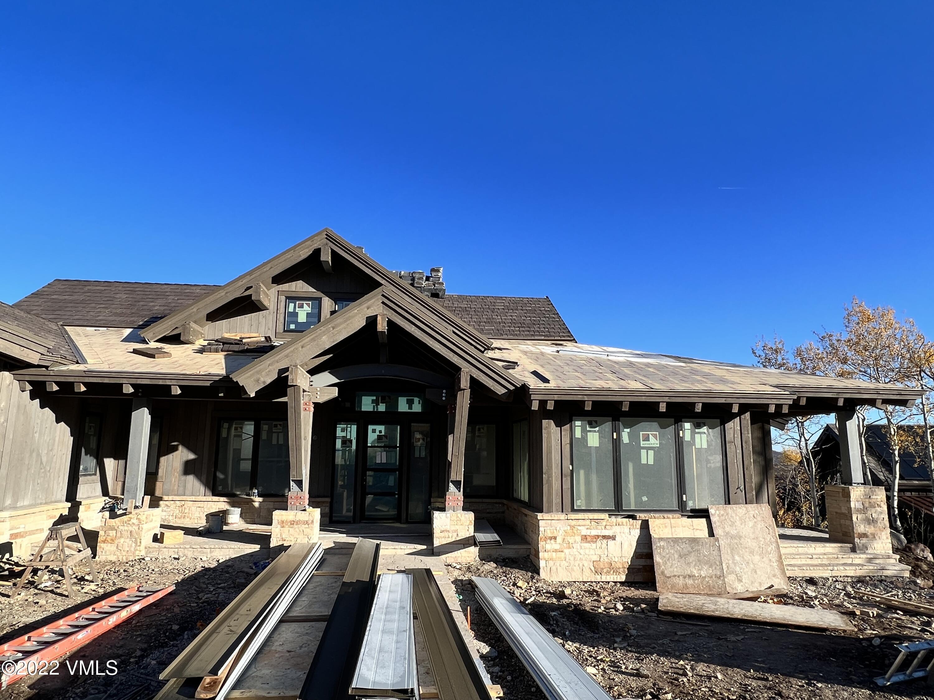 29 Kimberwick Way Edwards, CO 81632 - Photo 16 of 46 a view of a house with wooden floor and outdoor seating
