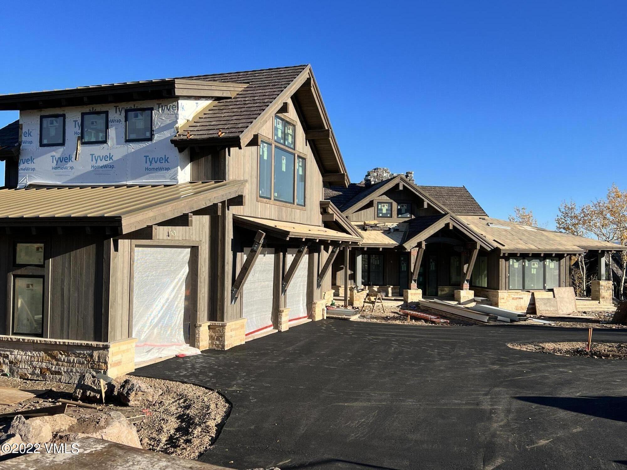 29 Kimberwick Way Edwards, CO 81632 - Photo 3 of 46 a front view of a house with a ocean view