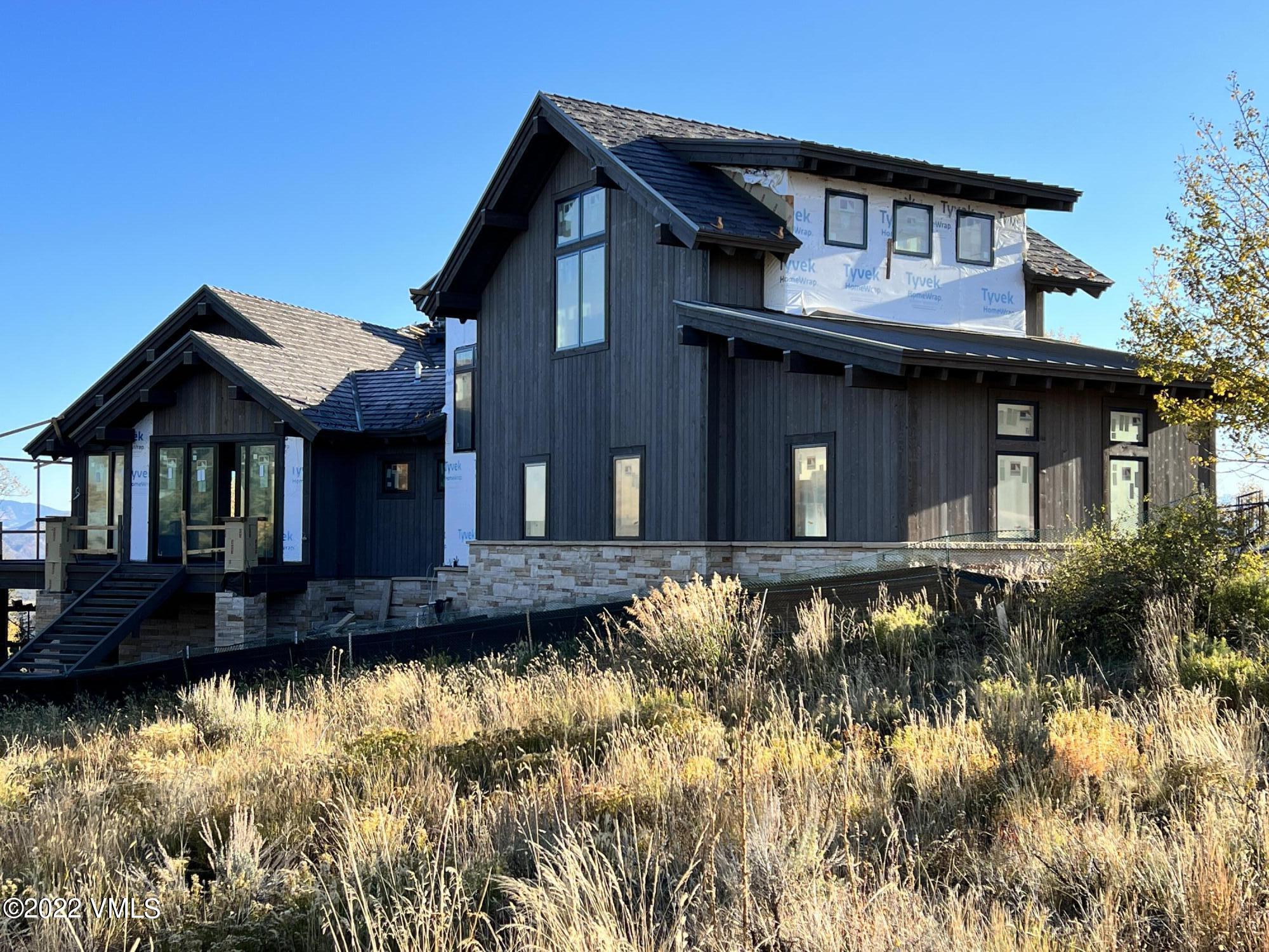 29 Kimberwick Way Edwards, CO 81632 - Photo 10 of 46 a front view of a house with a yard