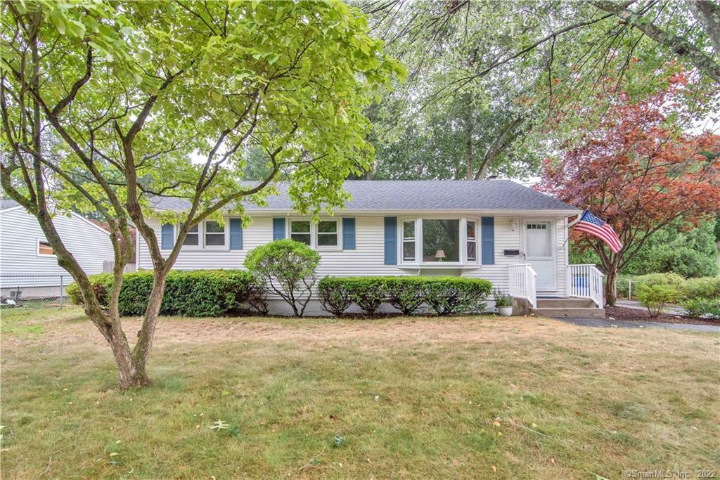 10 Dune Road Enfield, CT 06082 - Photo 1 of 1 a front view of a house with a yard