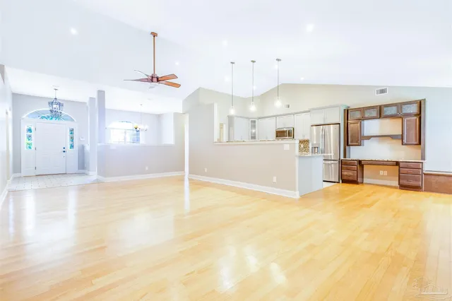 a view of a kitchen with furniture and a kitchen