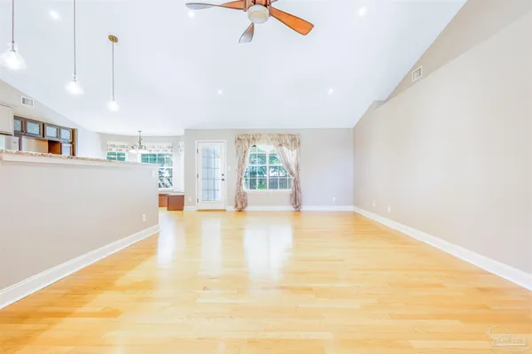 a view of an empty room with a window