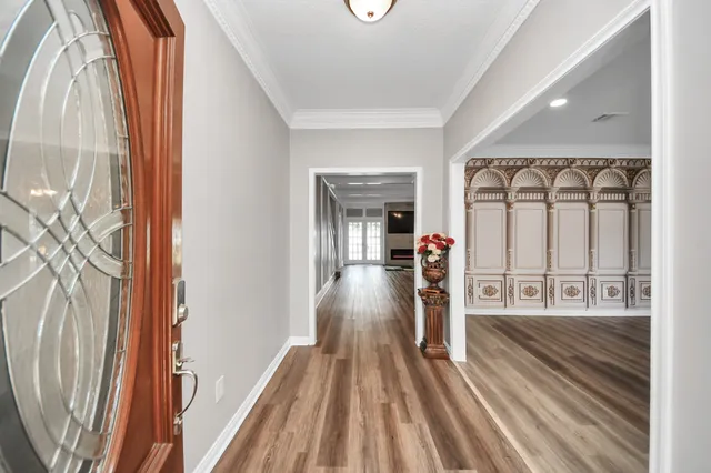 a view of a living room with a fireplace
