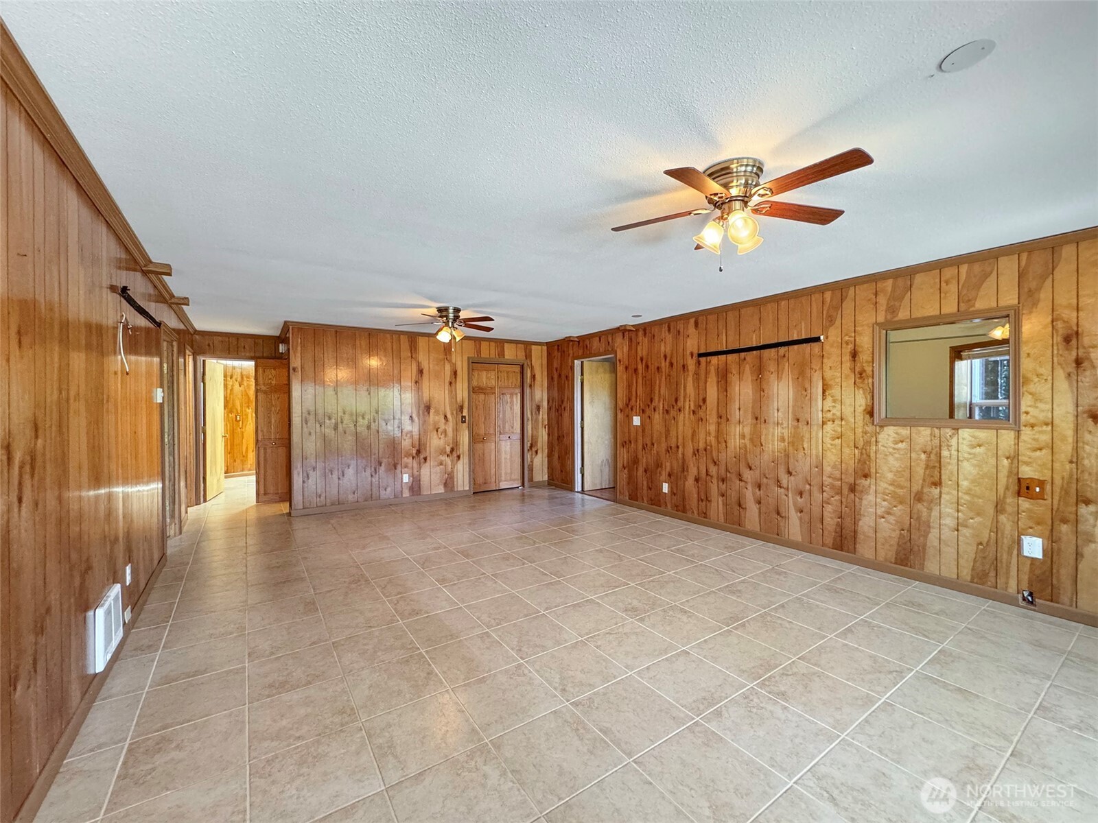 63 Hummingbird Lane Sequim, WA 98382 - Photo 29 of 40 a view of an empty room with a window