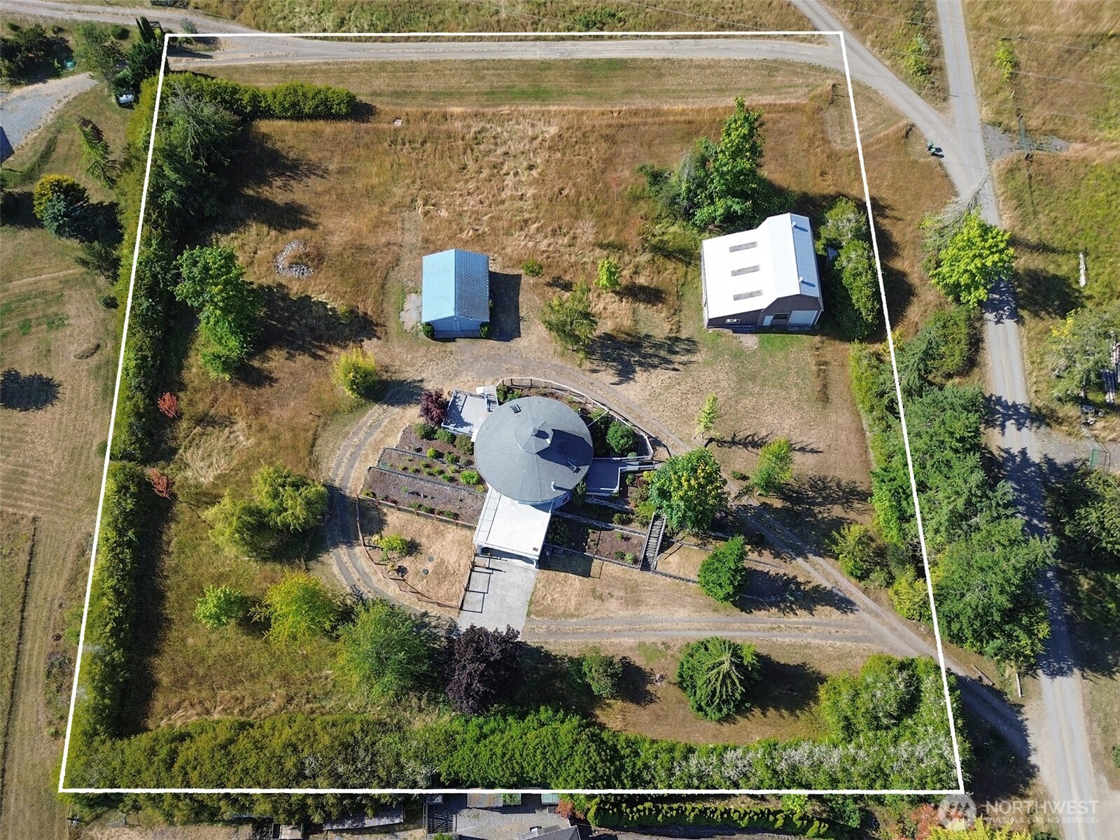 63 Hummingbird Lane Sequim, WA 98382 - Photo 40 of 40 an aerial view of residential house with outdoor space