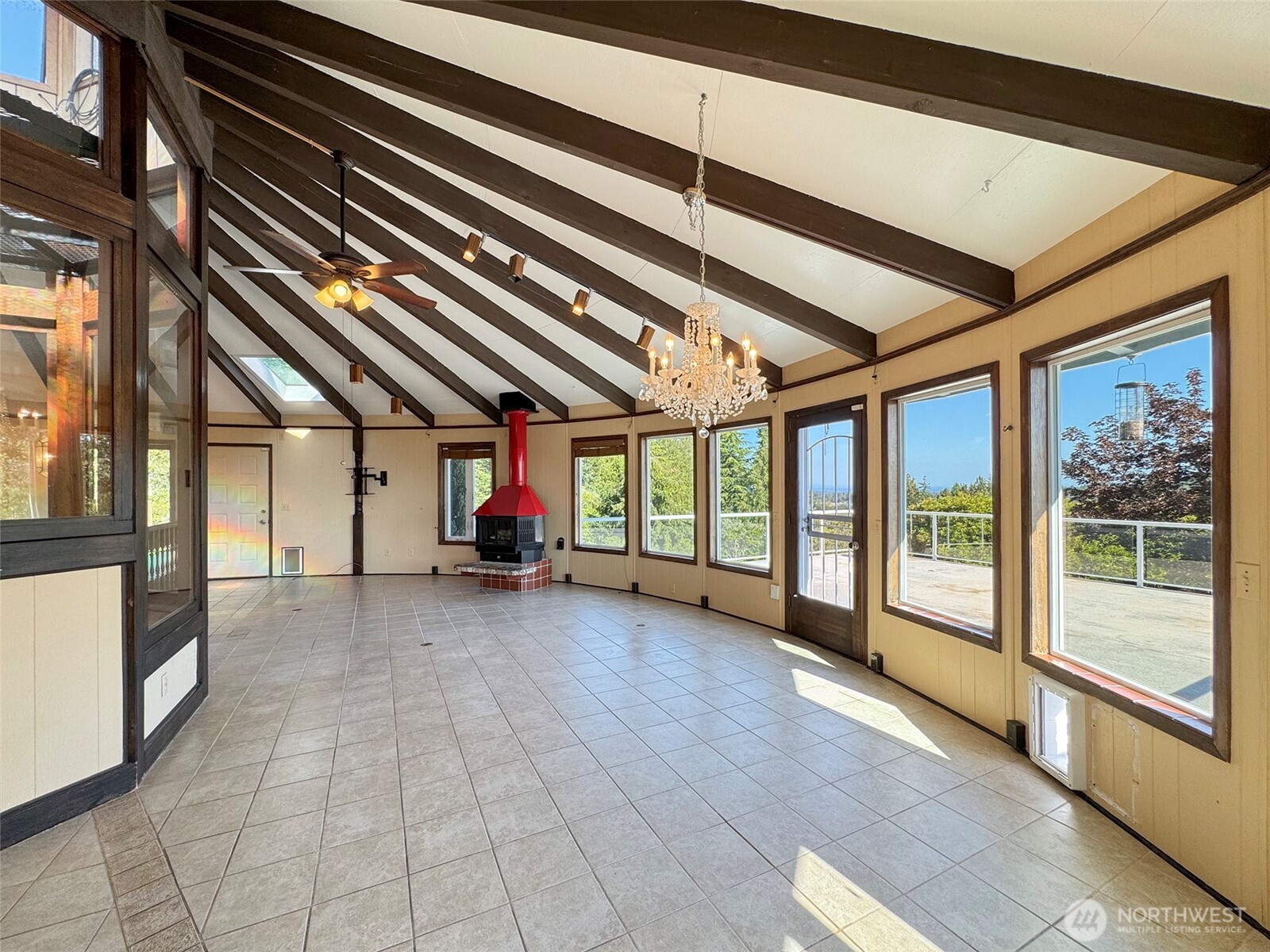 63 Hummingbird Lane Sequim, WA 98382 - Photo 9 of 40 a view of an empty room with a balcony