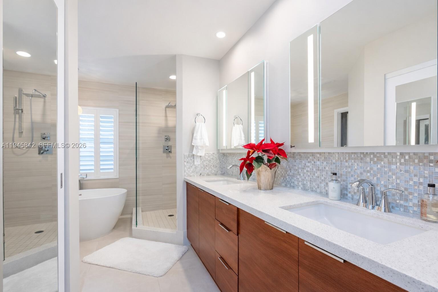 11291 Southwest 62nd Terrace Miami, FL 33173 - Photo 15 of 23 a bathroom with a sink a toilet and shower