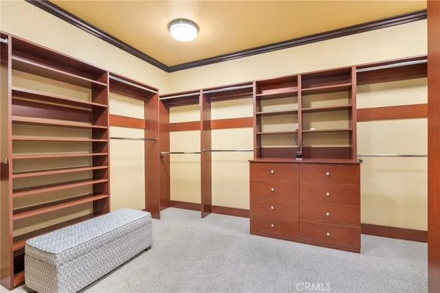 a living room with a bed and furniture