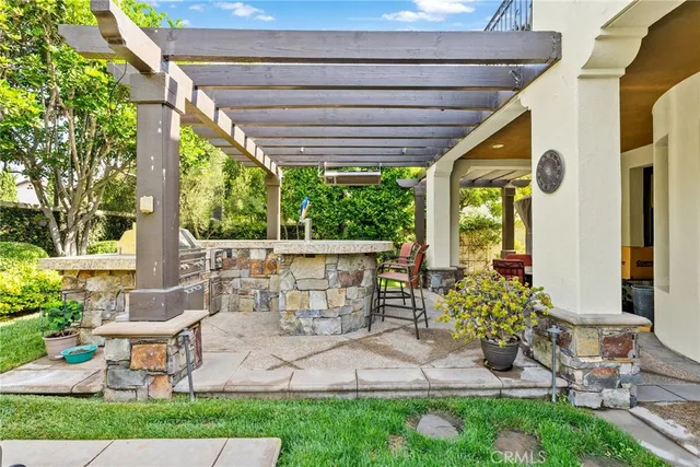 a dining room with a table and chairs