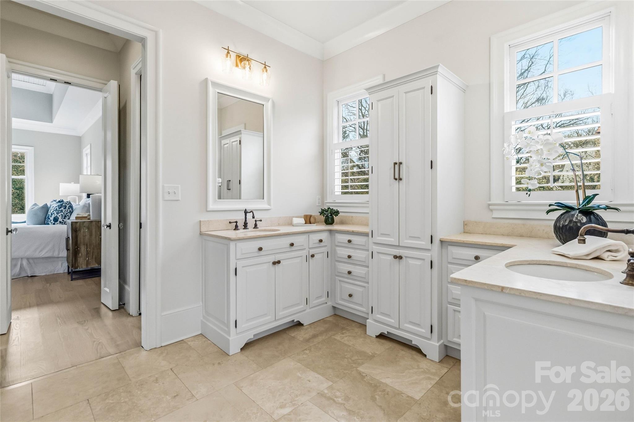 6321 Sharon Hills Road Charlotte, NC 28210 - Photo 26 of 46 a spacious bathroom with double sink and a mirror