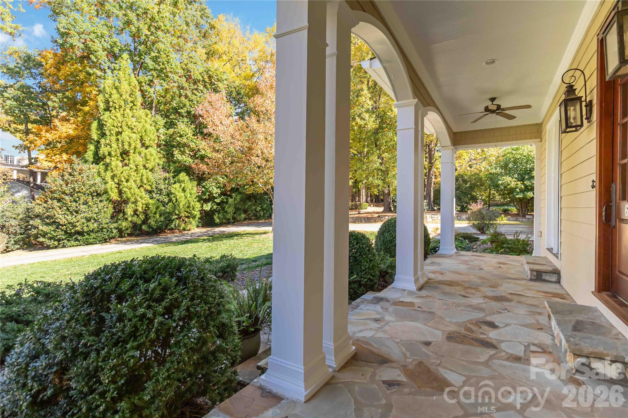 6321 Sharon Hills Road Charlotte, NC 28210 - Photo 4 of 46 a view of a porch with a yard