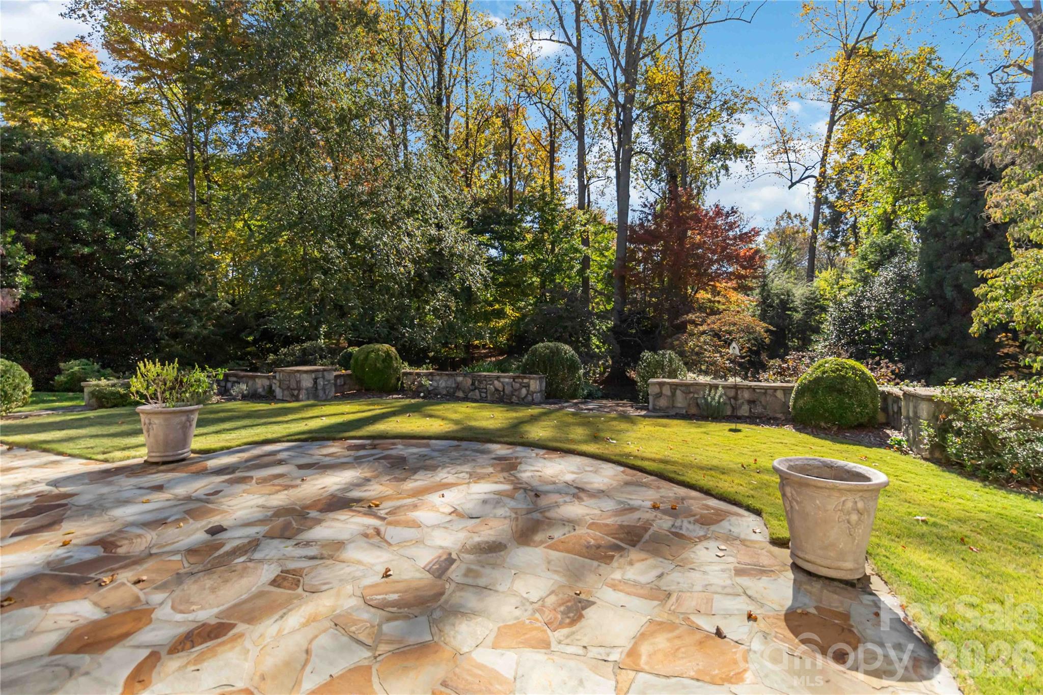 6321 Sharon Hills Road Charlotte, NC 28210 - Photo 43 of 46 a view of a swimming pool with a yard and sitting area