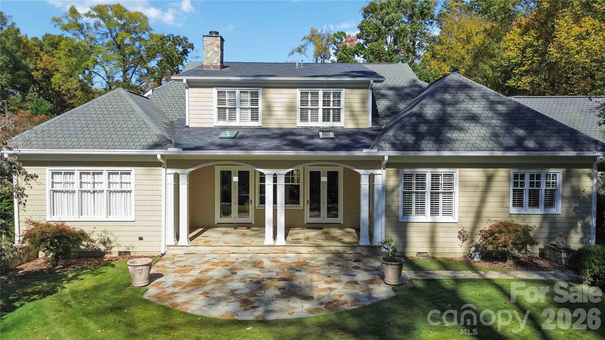 6321 Sharon Hills Road Charlotte, NC 28210 - Photo 44 of 46 front view of a house with a yard