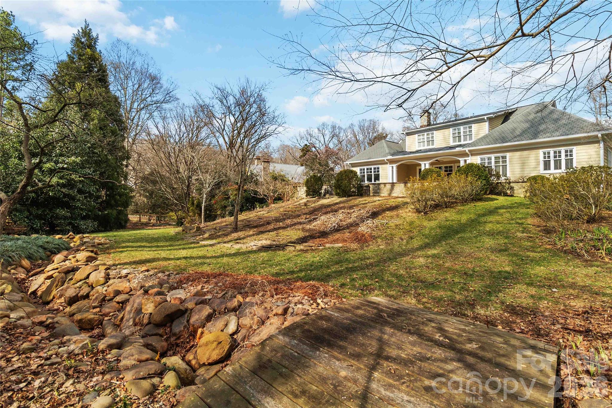 6321 Sharon Hills Road Charlotte, NC 28210 - Photo 45 of 46 a view of a yard in front of a house