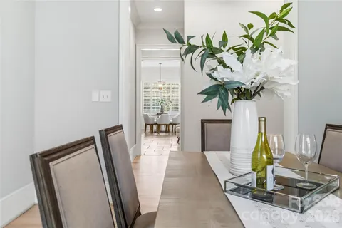 a view of living room with furniture and a potted plant