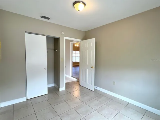 a view of an empty room and window