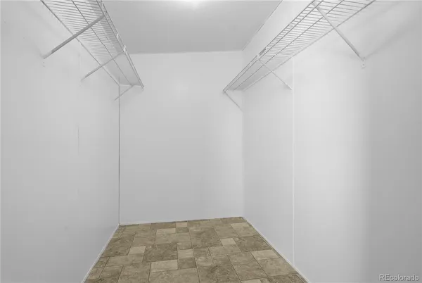 a view of a room with racks on the wall