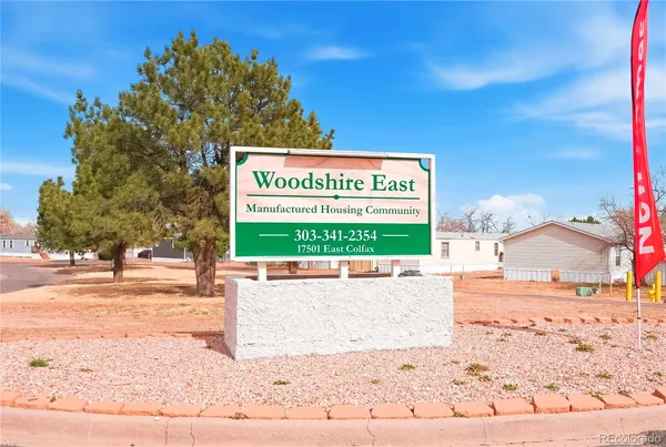 a view of a park with welcome board