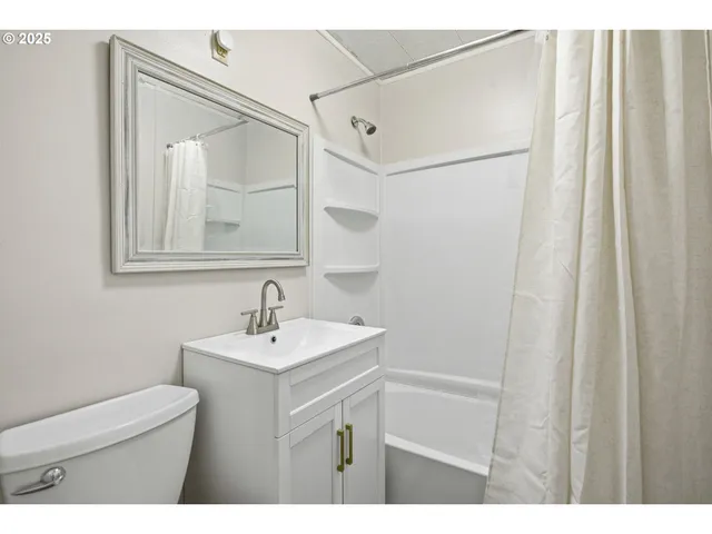 a room with furniture and a large window