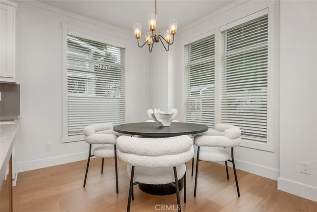 a kitchen with stainless steel appliances granite countertop a white stove top oven a sink and dishwasher