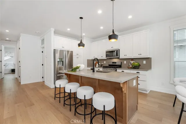 a view of a dining room with furniture and window